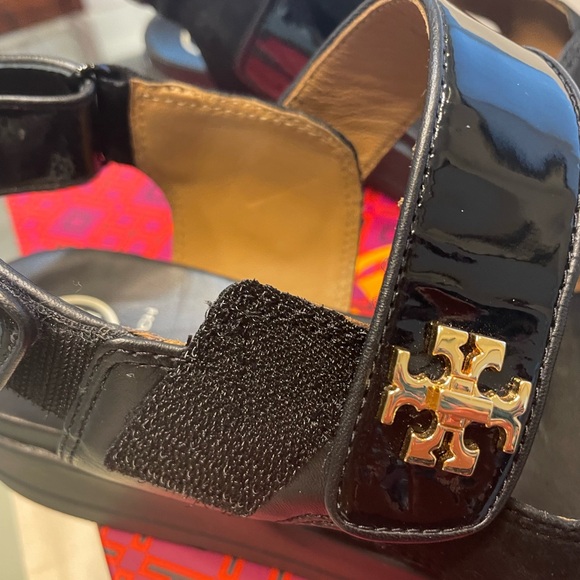 Tory Burch Glossy Black Sandals with Gold Accents - Picture 2 of 3